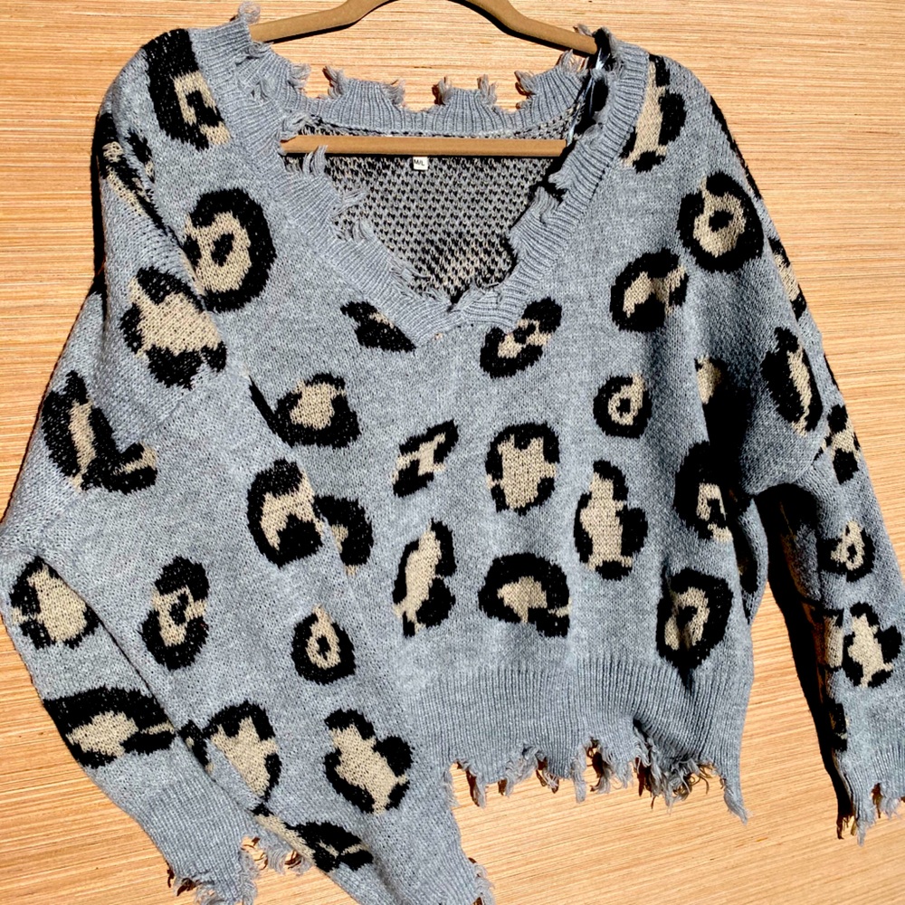 Ripped sweater